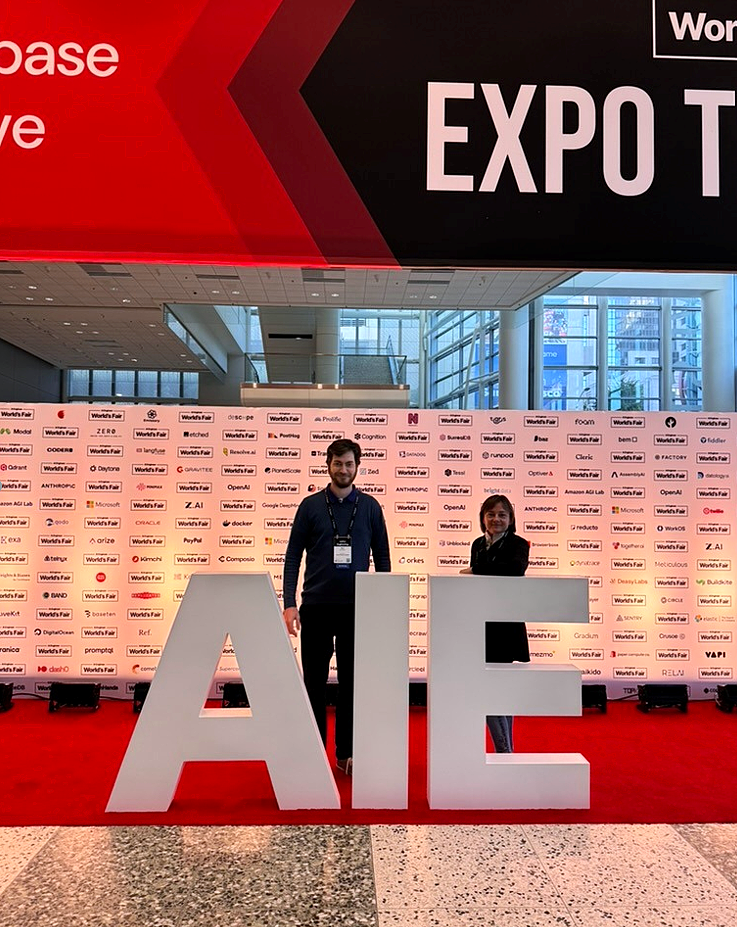 photo of Blaž Bertalanič and Carolina Fortuna at the AI Engineer World's Fair in San Francisco.